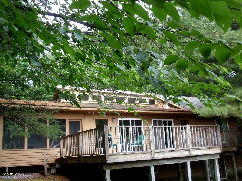 155 Bonny Rigg Hill Road Becket, MA 01223 - Photo 4 of 21 a front view of a house with a deck