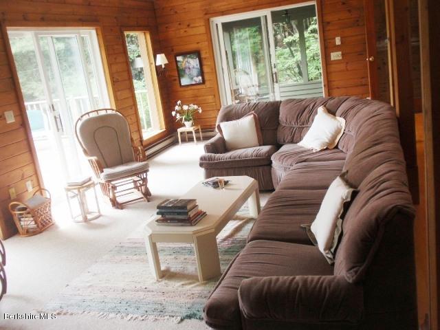 155 Bonny Rigg Hill Road Becket, MA 01223 - Photo 9 of 21 a living room with furniture and a large window