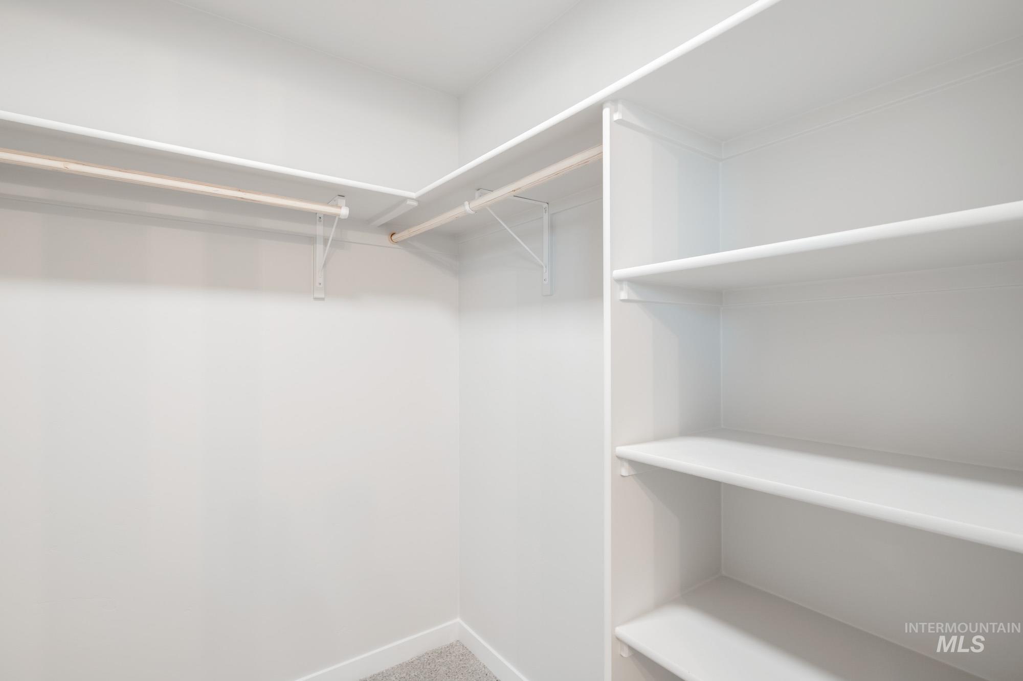 1711 North Birch Street Jerome, ID 83338 - Photo 11 of 16 Walk in closet featuring carpet flooring
