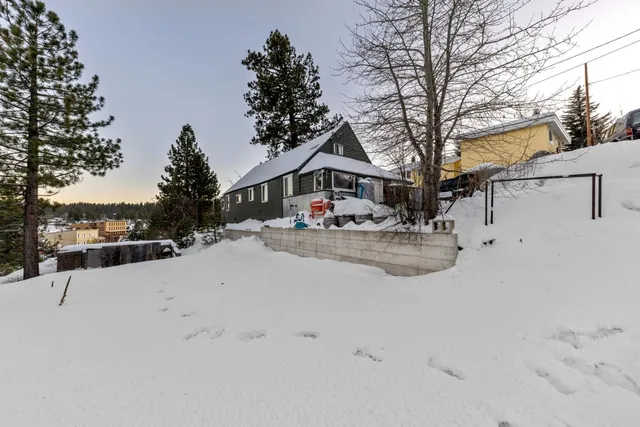 a view of a street with a trees park
