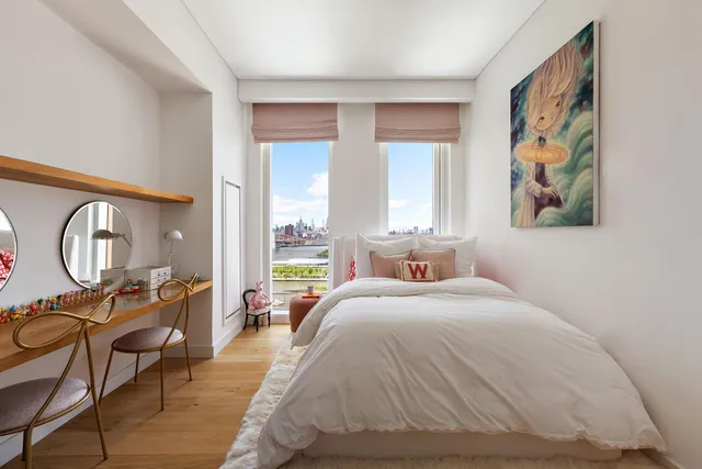 a bathroom with a tub sink and shower