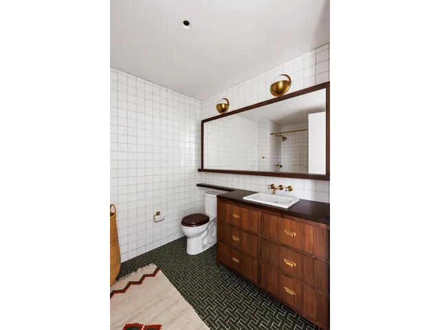 a view of a hallway with washer and dryer