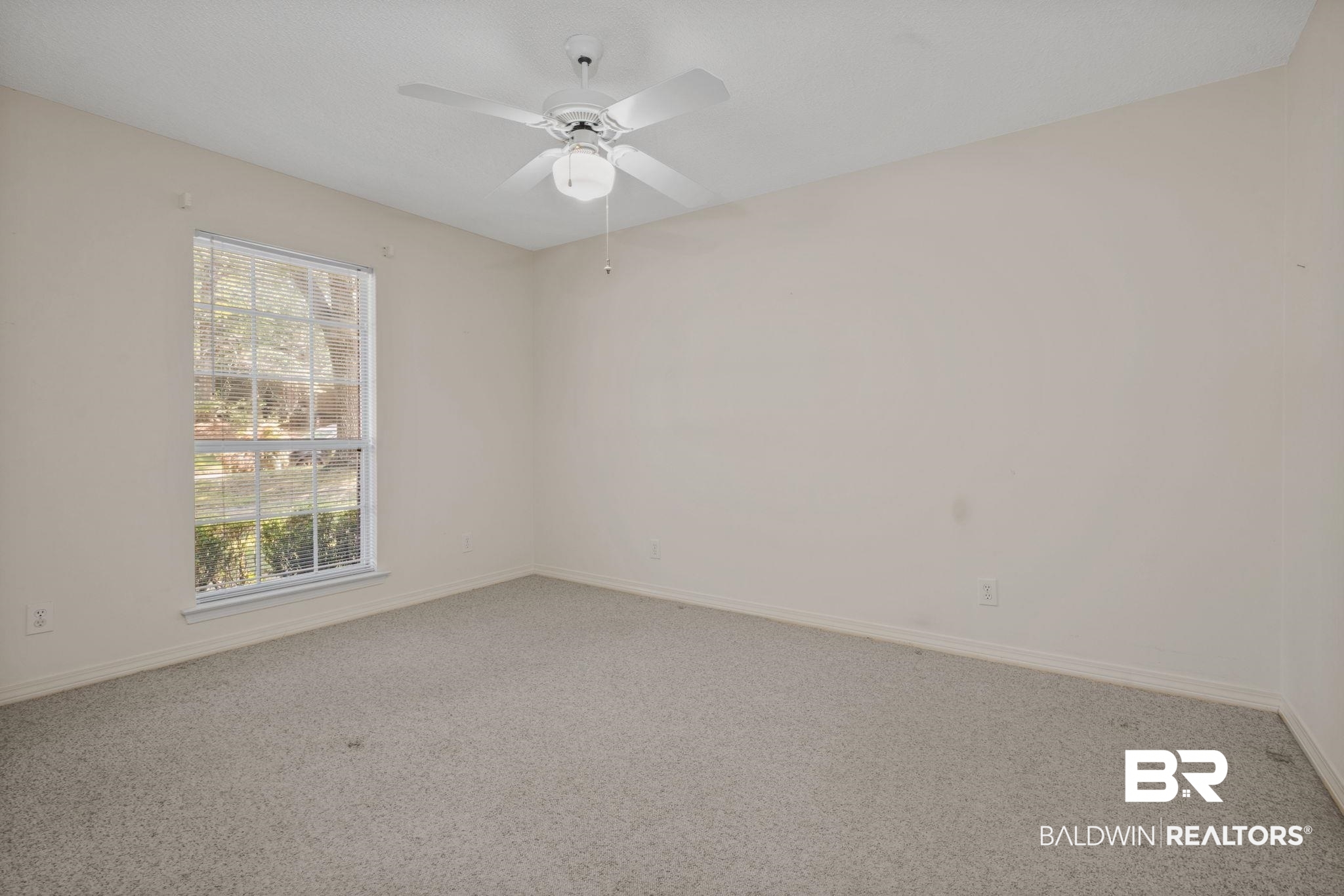 1340 Wellsley Court Mobile, AL 36695 - Photo 25 of 37 Spare room with light colored carpet and ceiling fan