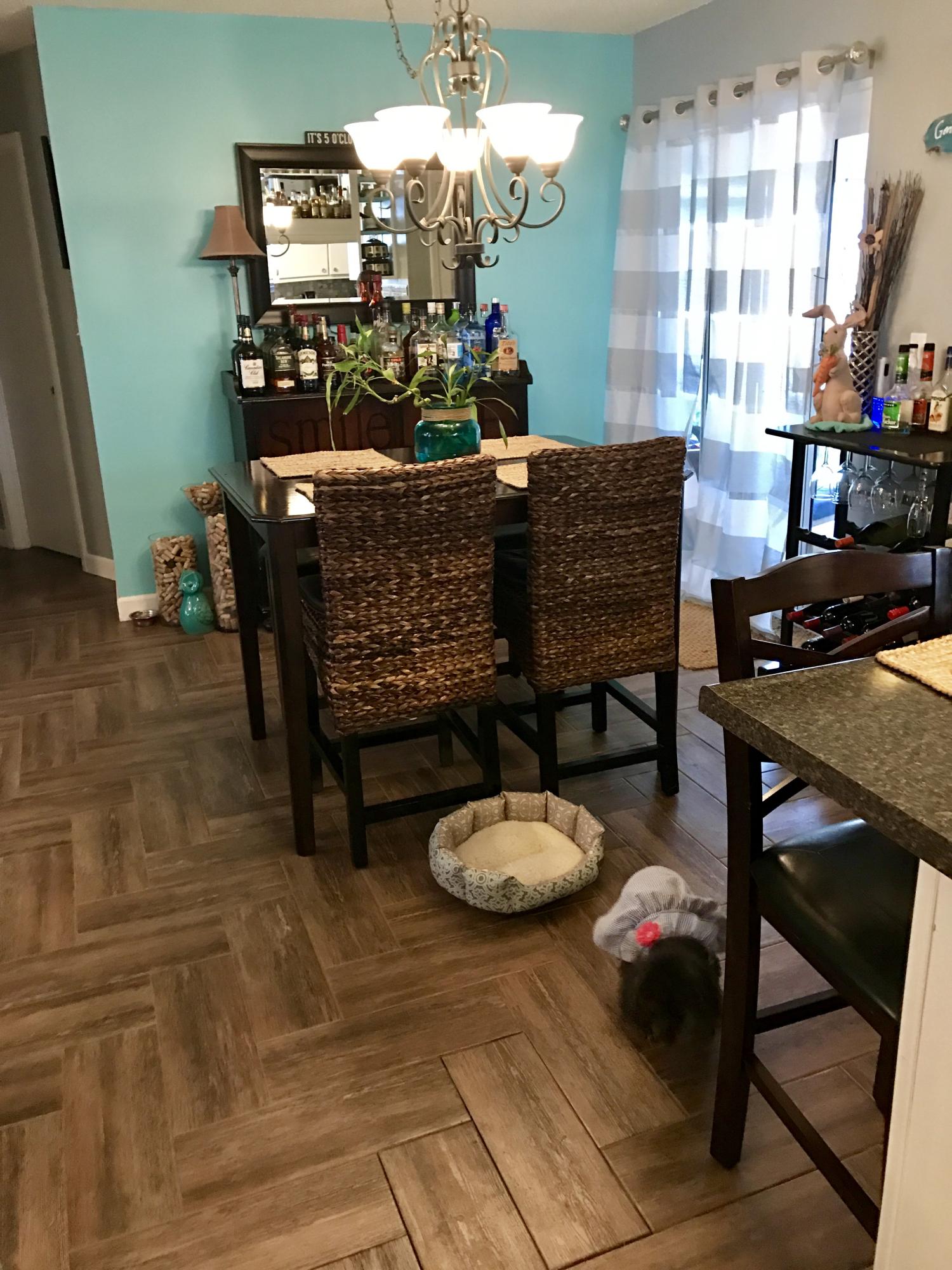 47 Ruby Circle Mary Esther, FL 32569 - Photo 19 of 30 a living room with furniture and a dining table