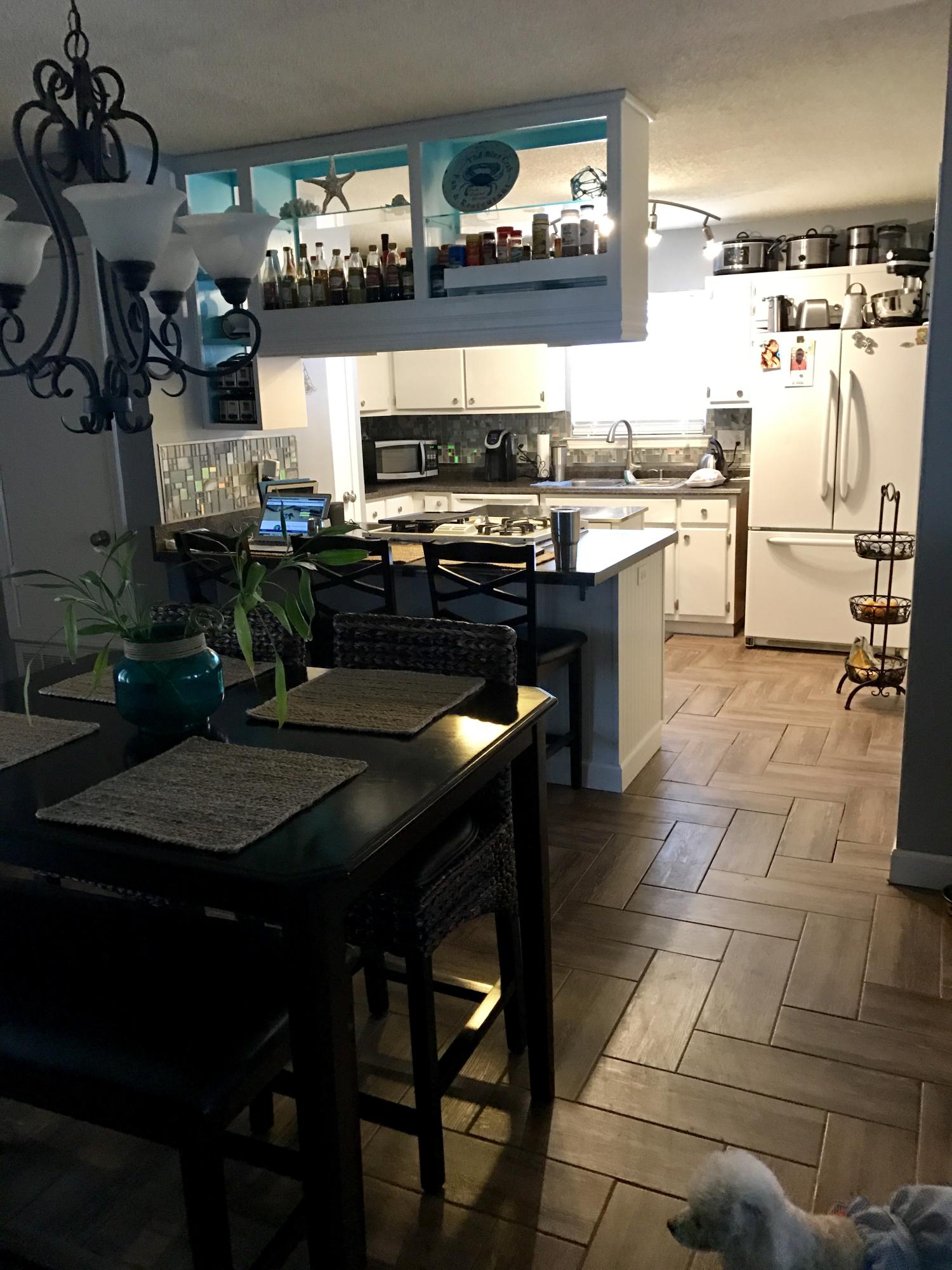 47 Ruby Circle Mary Esther, FL 32569 - Photo 20 of 30 a kitchen with stainless steel appliances granite countertop a stove a sink and a refrigerator