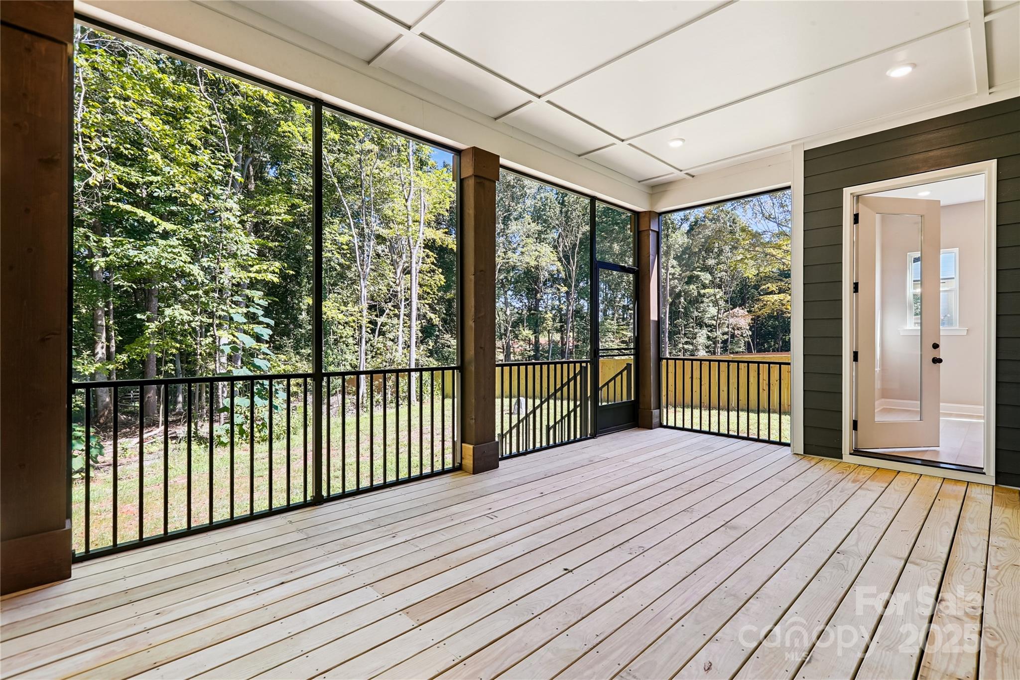 552 Fern Hill Road Mooresville, NC 28117 - Photo 9 of 12 a view of a balcony with wooden floor