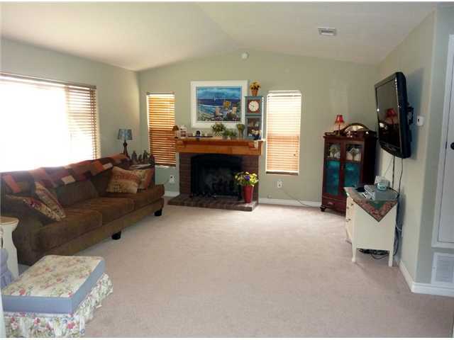 840 Fulton Road San Marcos, CA 92069 - Photo 6 of 14 Living room with high ceilings and a fireplace, or would make a great office