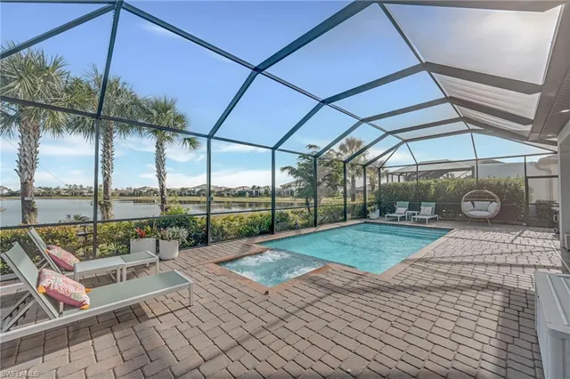 a view of outdoor space with seating area and barbeque oven