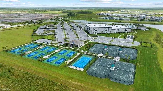 a view of a living room filled with furniture