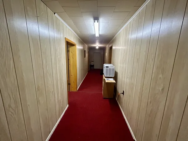 a room with stairs and table