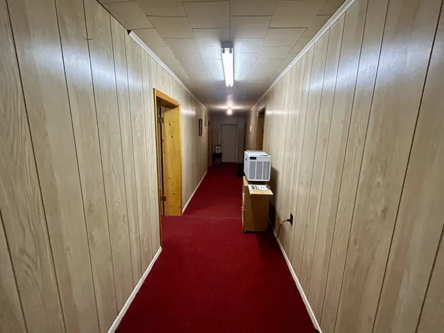 a room with stairs and table