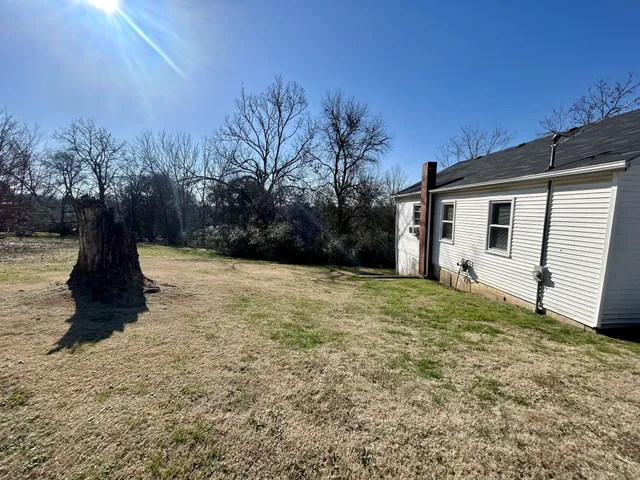 a fire hydrant in the middle of a field