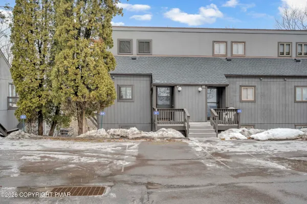 a view of house with yard