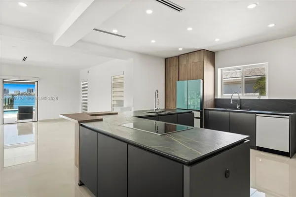 a view of kitchen and hallway