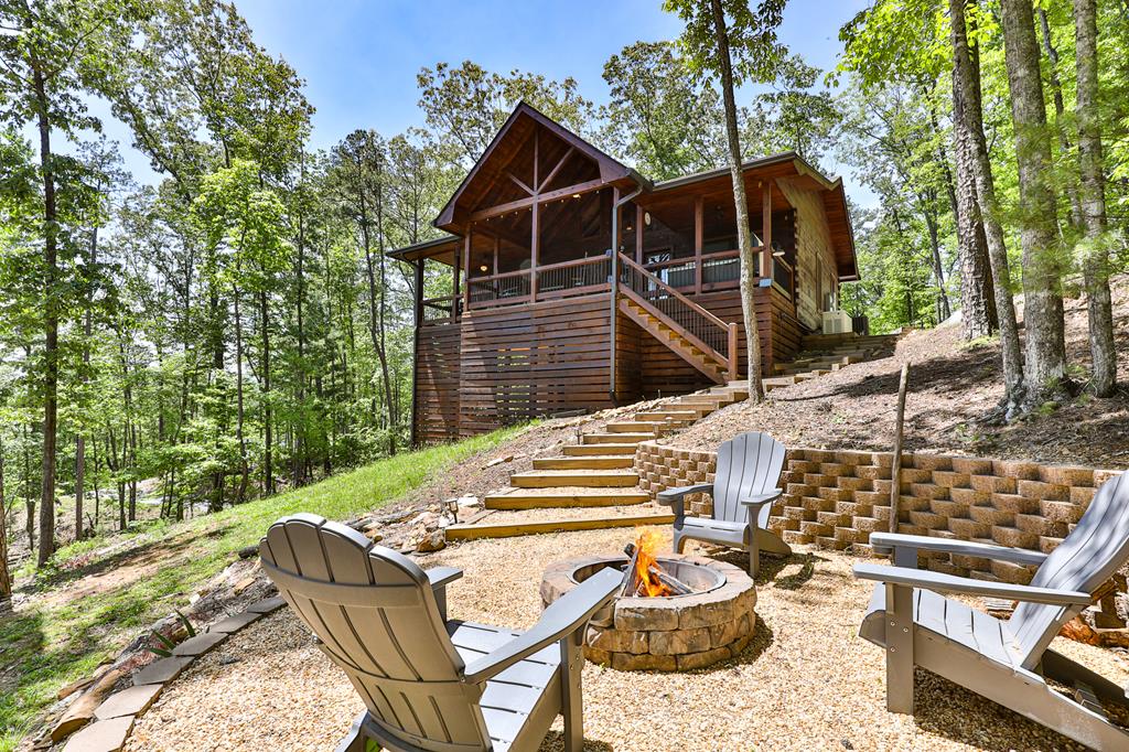 a view of a chairs and table in the patio
