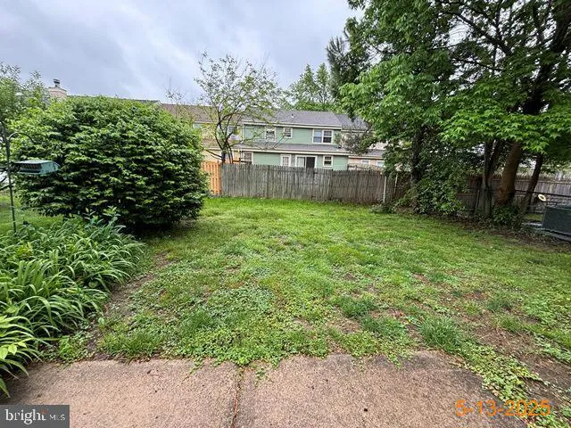 a view of a backyard with a garden