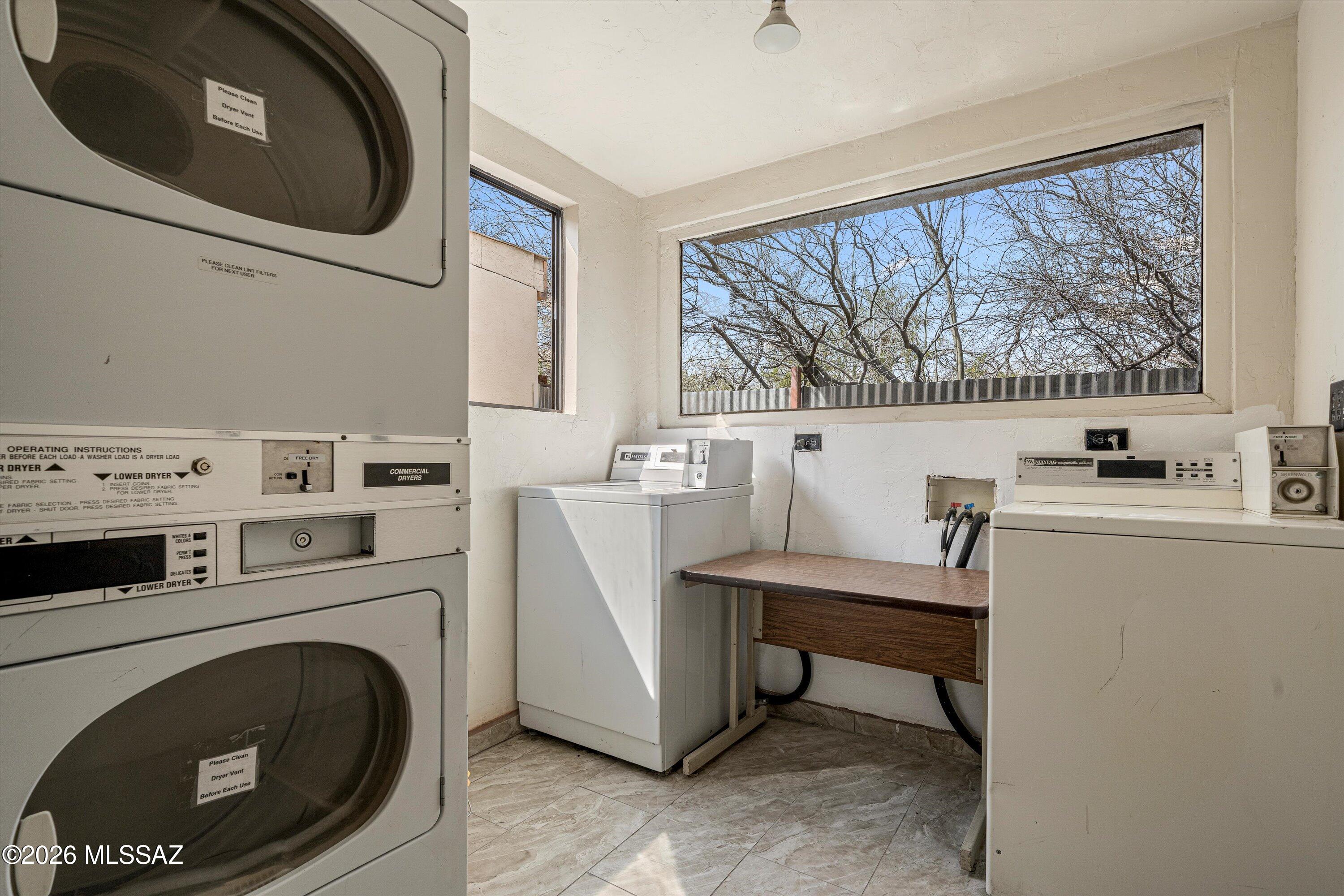 2619 East Prince Road Tucson, AZ 85716 - Photo 10 of 50 a view of a room with washer and dryer