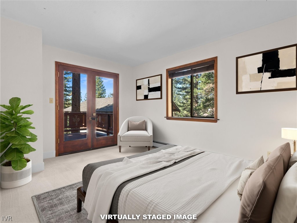 1106 Altdorf Terrace Incline Village, NV 89451 - Photo 6 of 50 a bedroom with a bed and glass windows
