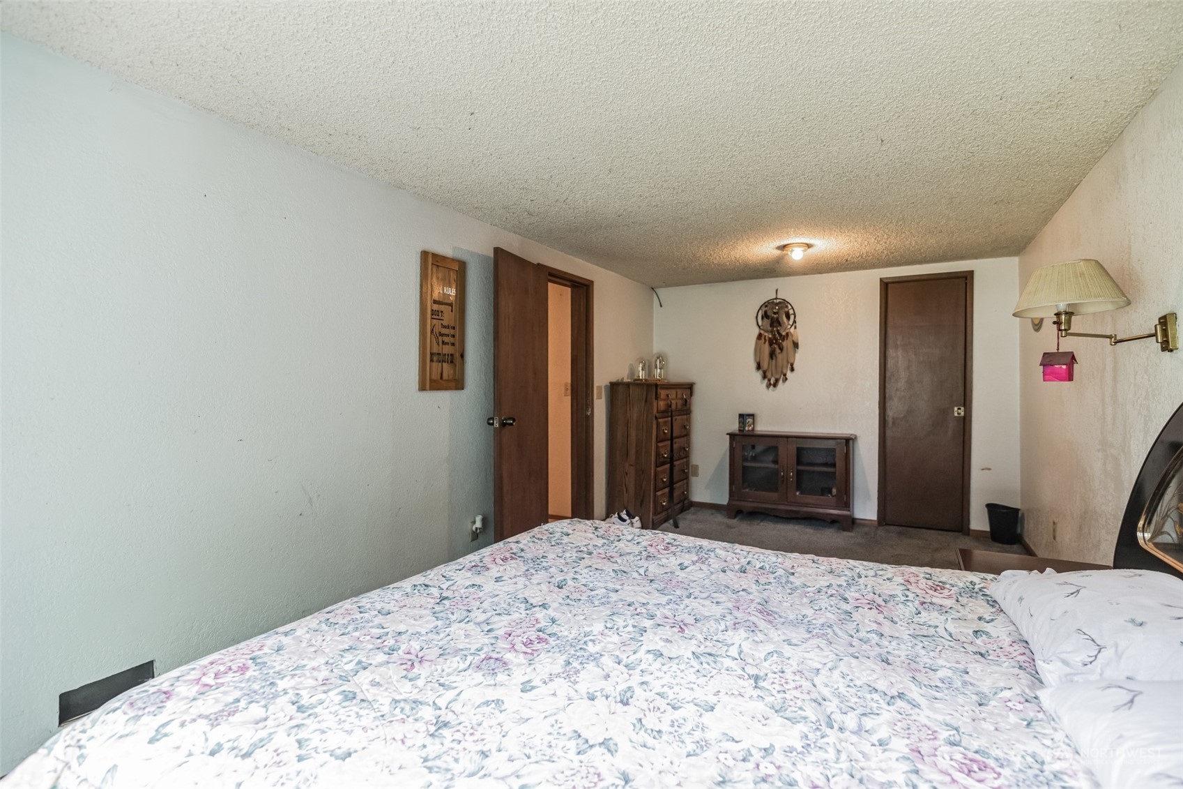 22824 7th Avenue Southeast Bothell, WA 98021 - Photo 13 of 21 a bedroom with a bed and a dresser in it