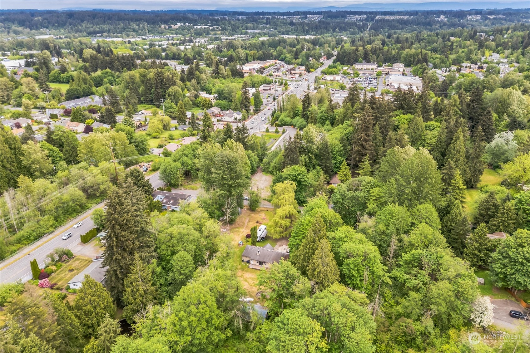 22824 7th Avenue Southeast Bothell, WA 98021 - Photo 21 of 21 a view of a city with lush green forest