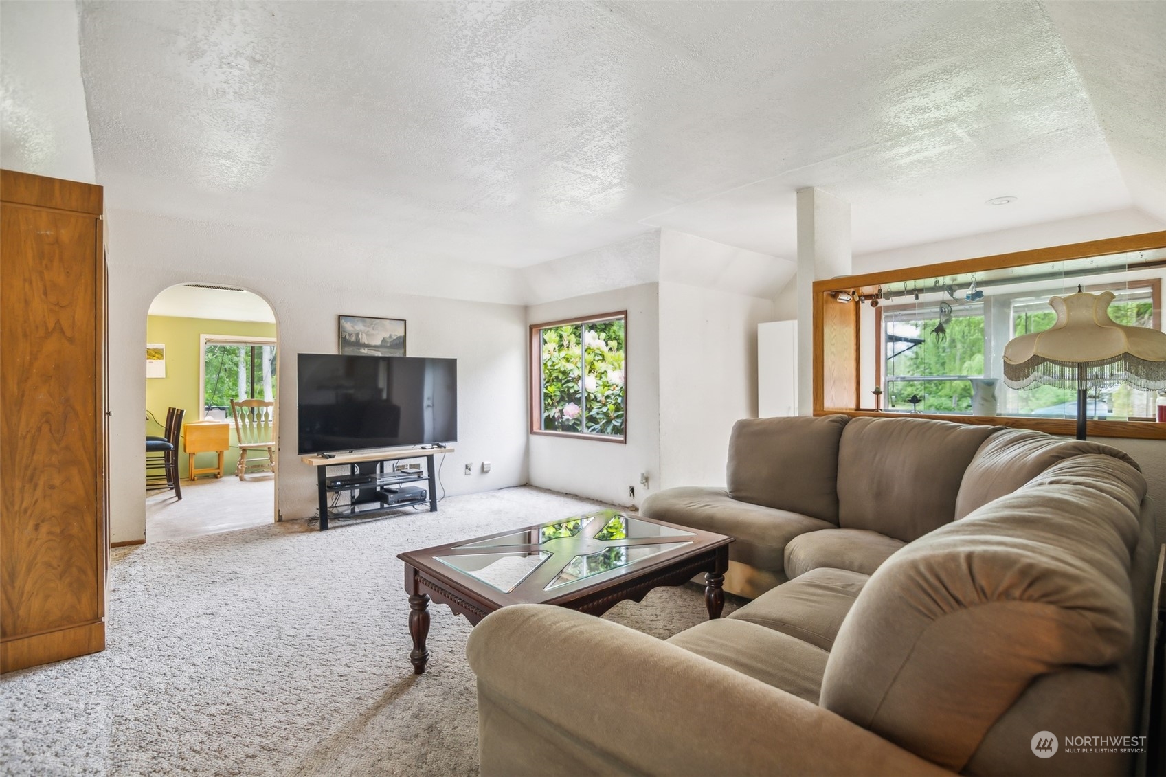 22824 7th Avenue Southeast Bothell, WA 98021 - Photo 6 of 21 a living room with furniture and a flat screen tv