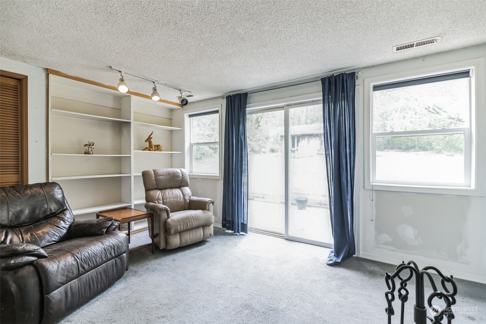 22824 7th Avenue Southeast Bothell, WA 98021 - Photo 10 of 21 a living room with furniture and a large window