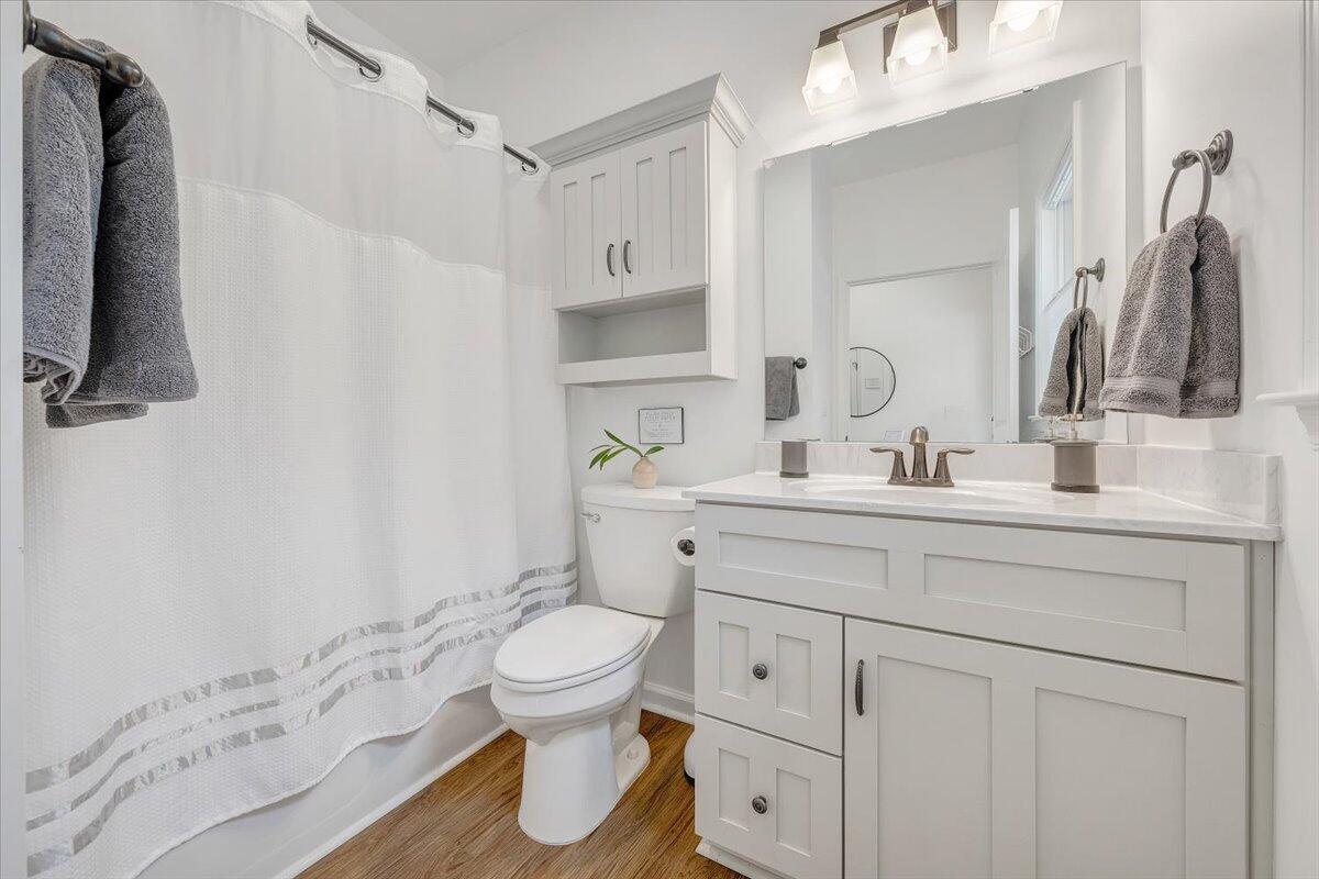 1373 Thomason Lane Goodview, VA 24095 - Photo 16 of 89 a bathroom with a sink toilet and shower