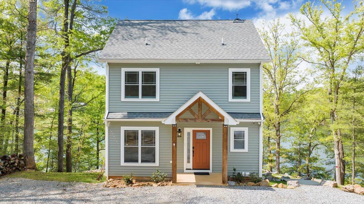 1373 Thomason Lane Goodview, VA 24095 - Photo 59 of 89 a front view of a house with a yard