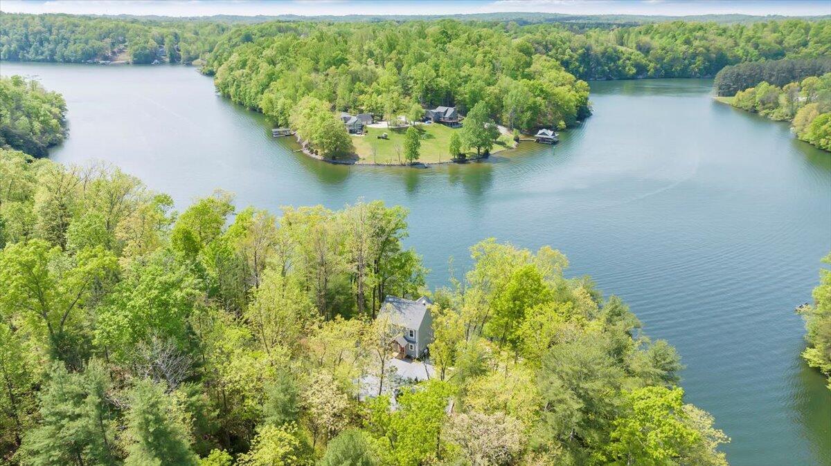 1373 Thomason Lane Goodview, VA 24095 - Photo 80 of 89 a view of a lake with a mountain in the background