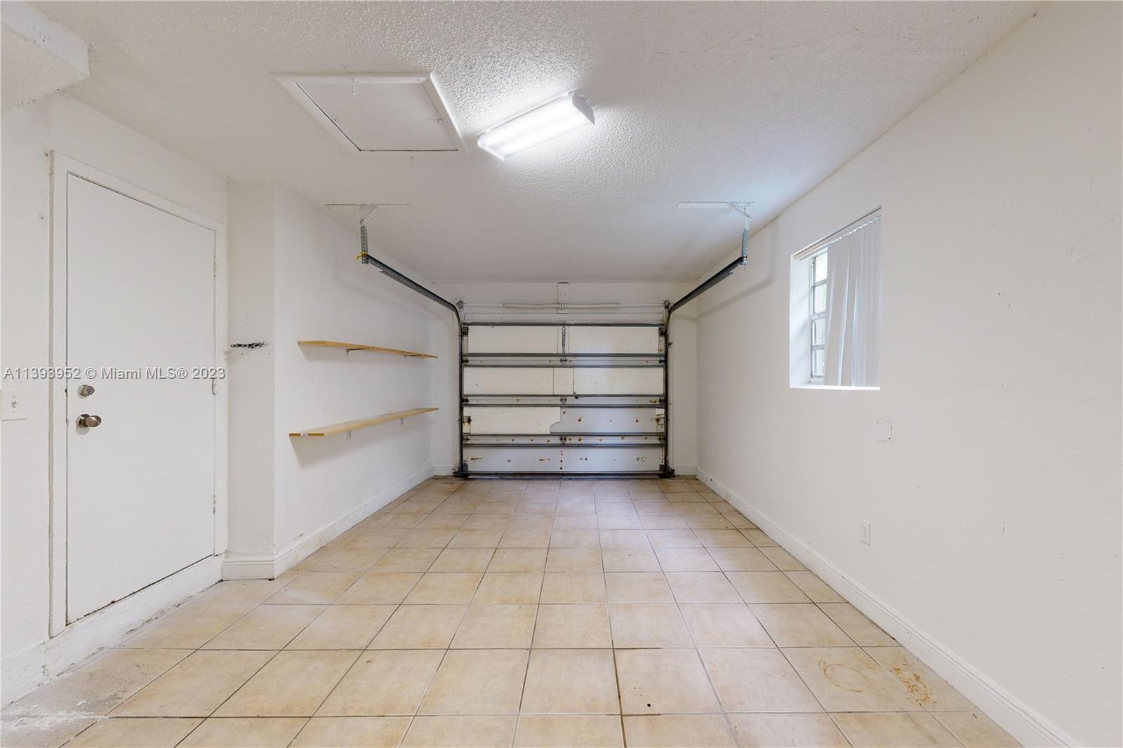 16813 Southwest 107th Place Miami, FL 33157 - Photo 19 of 28 a view of room with natural light