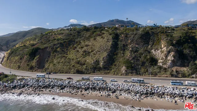 a view of a road with a building in the background