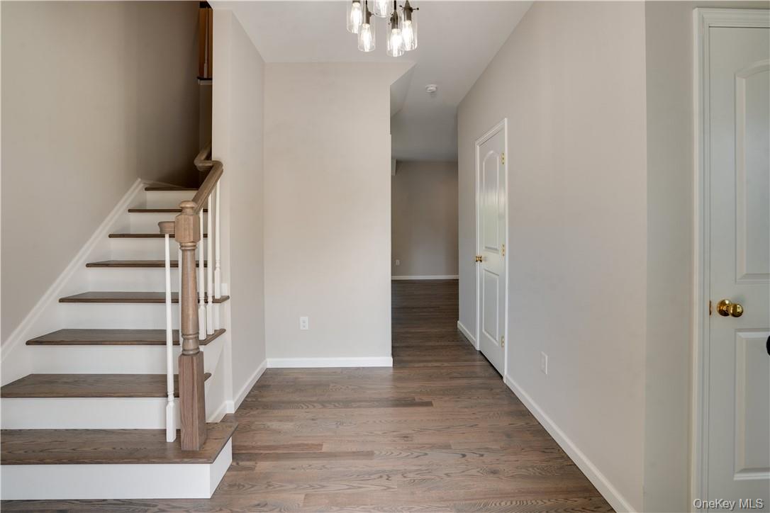 991 Freedom Road Pleasant Valley, NY 12569 - Photo 2 of 23 a view of a hallway with wooden floor and entryway