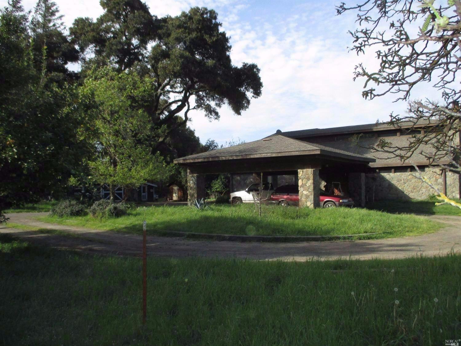 1970 Indian Valley Road Novato, CA 94947 - Photo 1 of 1 a front view of a house with a garden