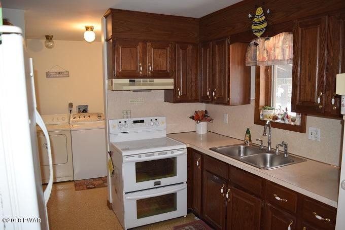 101 Burrus Road Greentown, PA 18426 - Photo 16 of 25 a kitchen with a sink stove and refrigerator