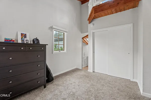 a view of room with cabinet and closet