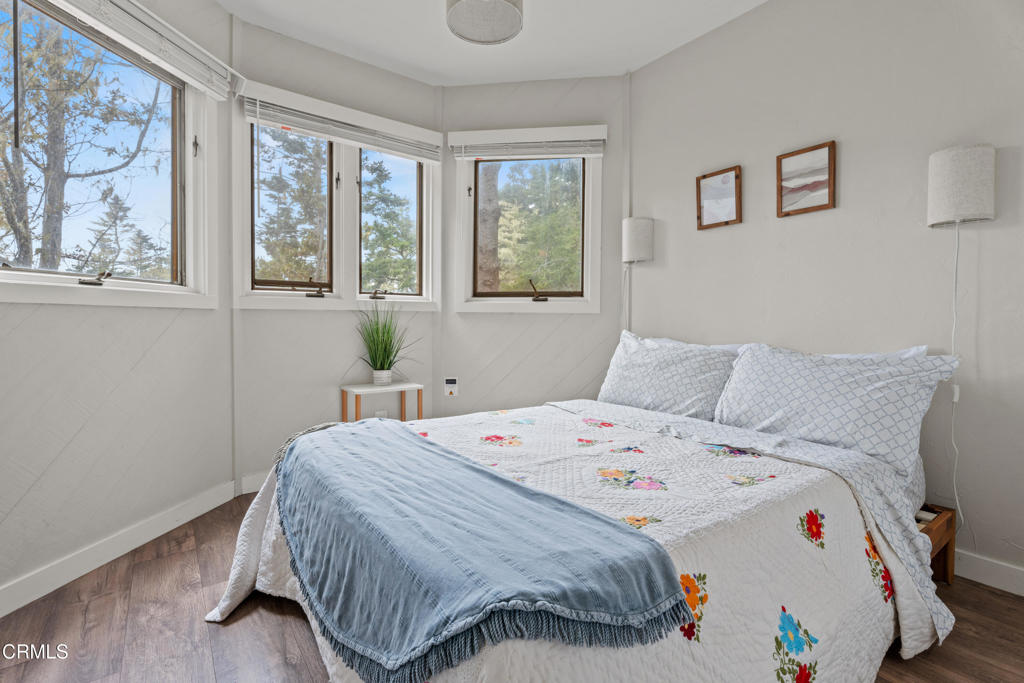 15741 Forest View Road Manchester, CA 95459 - Photo 14 of 27 a bedroom with a bed and a window