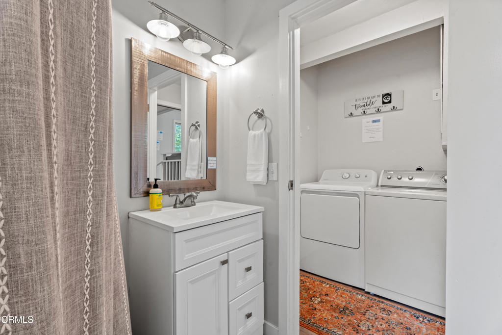 15741 Forest View Road Manchester, CA 95459 - Photo 15 of 27 a utility room with closet dryer and washer