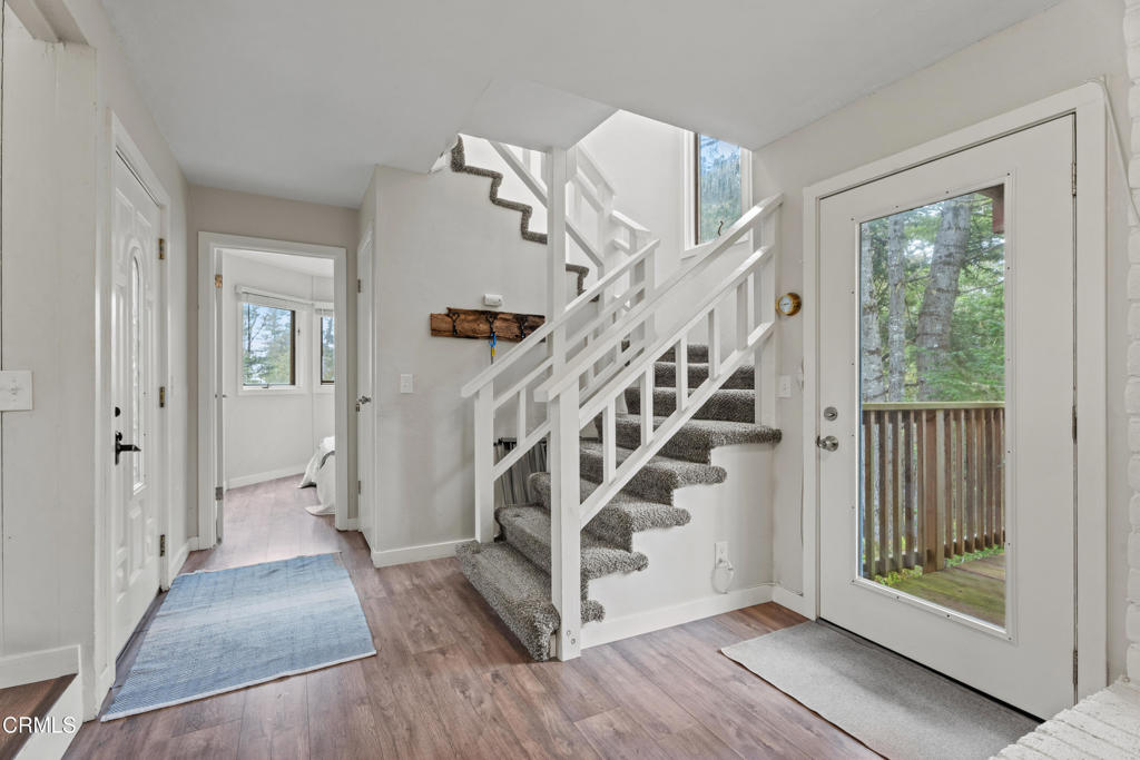 15741 Forest View Road Manchester, CA 95459 - Photo 16 of 27 a view of entryway with wooden floor and a front door