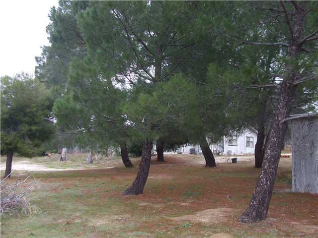 2071 Buckman Springs Road Campo, CA 91906 - Photo 6 of 11 From the West property line toward house. garage on right