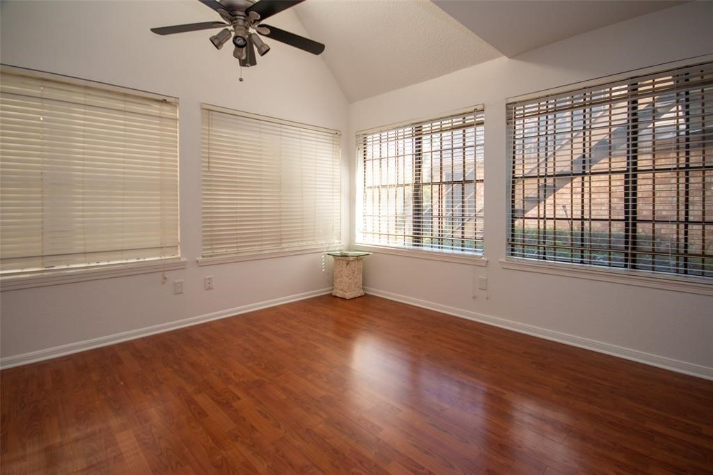 2425 Holly Hall Street, Unit 31 Houston, TX 77054 - Photo 2 of 9 wooden floor in an empty room with a window