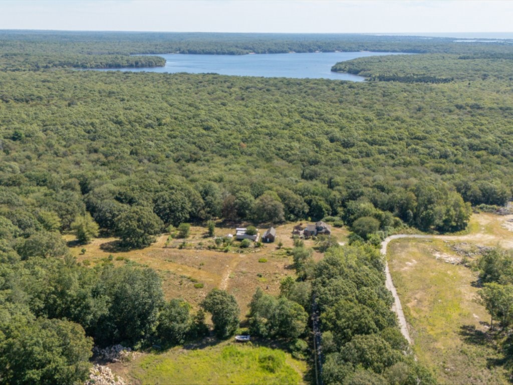 473 Klondike Road Charlestown, RI 02813 - Photo 7 of 20 The best of both worlds. The property is close to beaches and the 'highway' , yet surrounded by open space in the back, providing a high degree of privacy. Opportunity abounds.