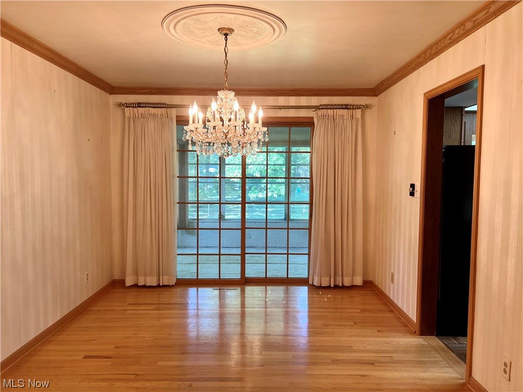 3536 Oak Road Stow, OH 44224 - Photo 9 of 32 Another View of the dining room with sliding doors leading out to the sunroom! So much natural light!