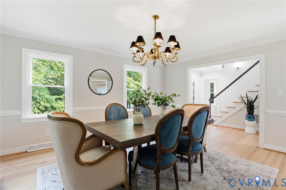2904 Old Gun Road West Midlothian, VA 23113 - Photo 10 of 59 Dining area featuring crown molding, chair rail mo