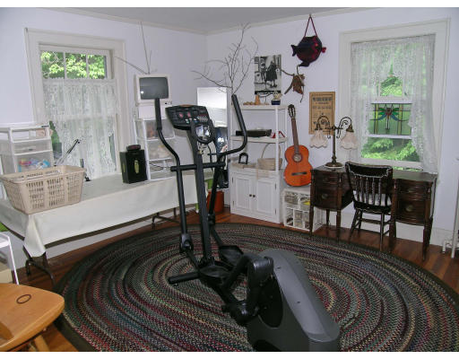 35 Gammons Road Newton, MA 02468 - Photo 8 of 14 a view of a dining room with furniture a chandelier and window