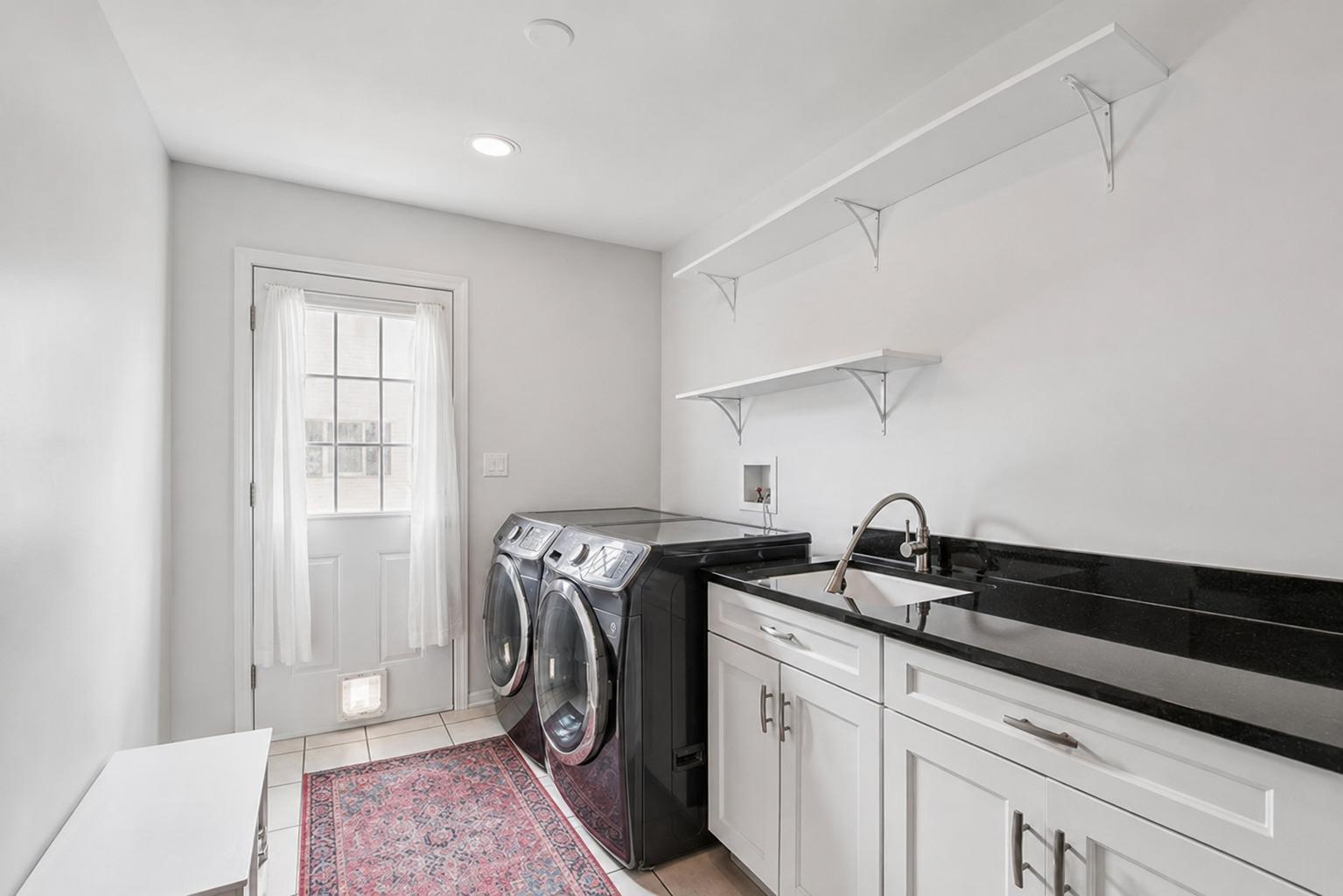 250 Wilshire Road Lake Forest, IL 60045 - Photo 12 of 28 a utility room with sink dryer and washer