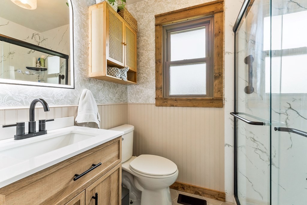 1653 Lester Flatt Road Sparta, TN 38583 - Photo 24 of 59 a bathroom with a sink and a toilet