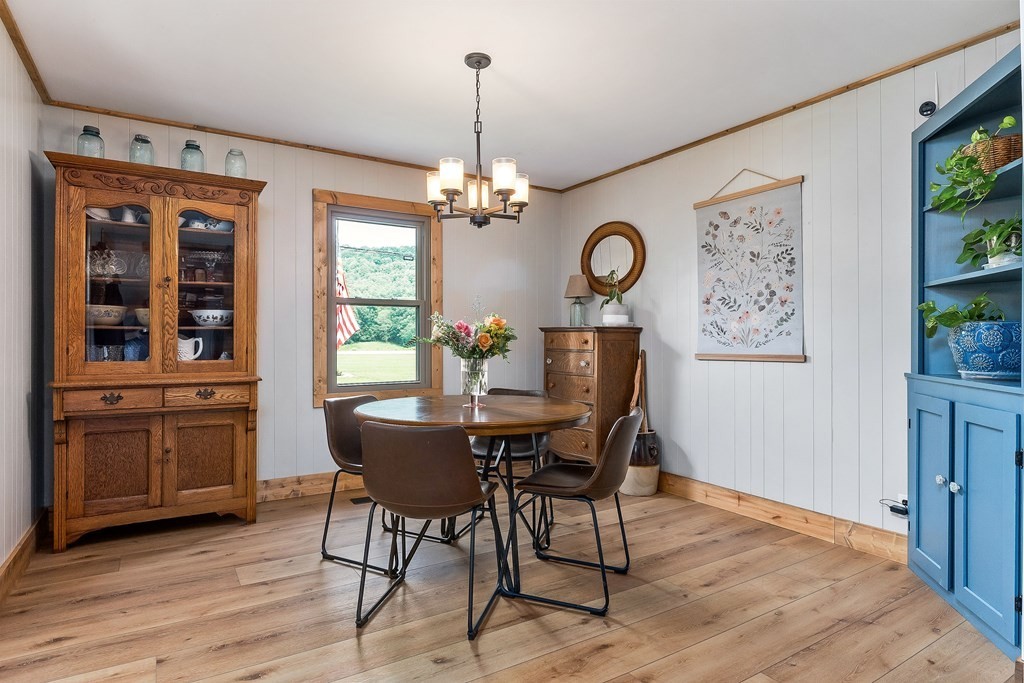 1653 Lester Flatt Road Sparta, TN 38583 - Photo 28 of 59 a view of a dining room with furniture window and wooden floor