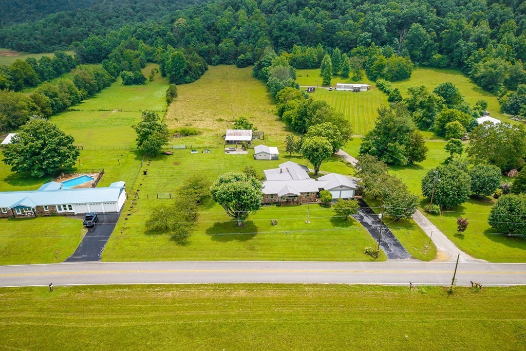 1653 Lester Flatt Road Sparta, TN 38583 - Photo 3 of 59 a view of a swimming pool with a yard