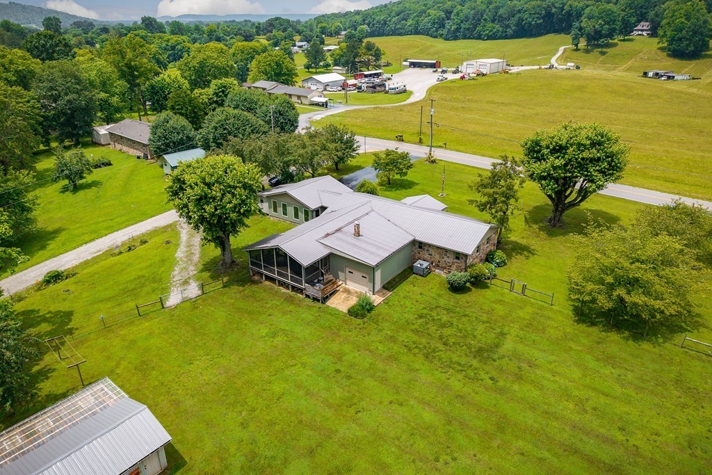 1653 Lester Flatt Road Sparta, TN 38583 - Photo 4 of 59 an aerial view of a house with a garden