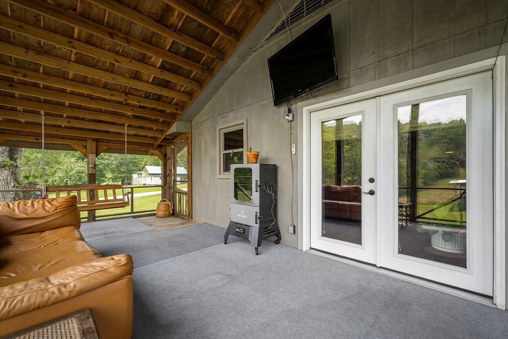 1653 Lester Flatt Road Sparta, TN 38583 - Photo 42 of 59 a view of a porch with furniture and a porch